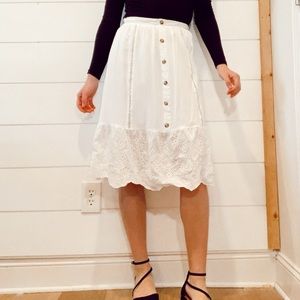 tea length white skirt with buttons